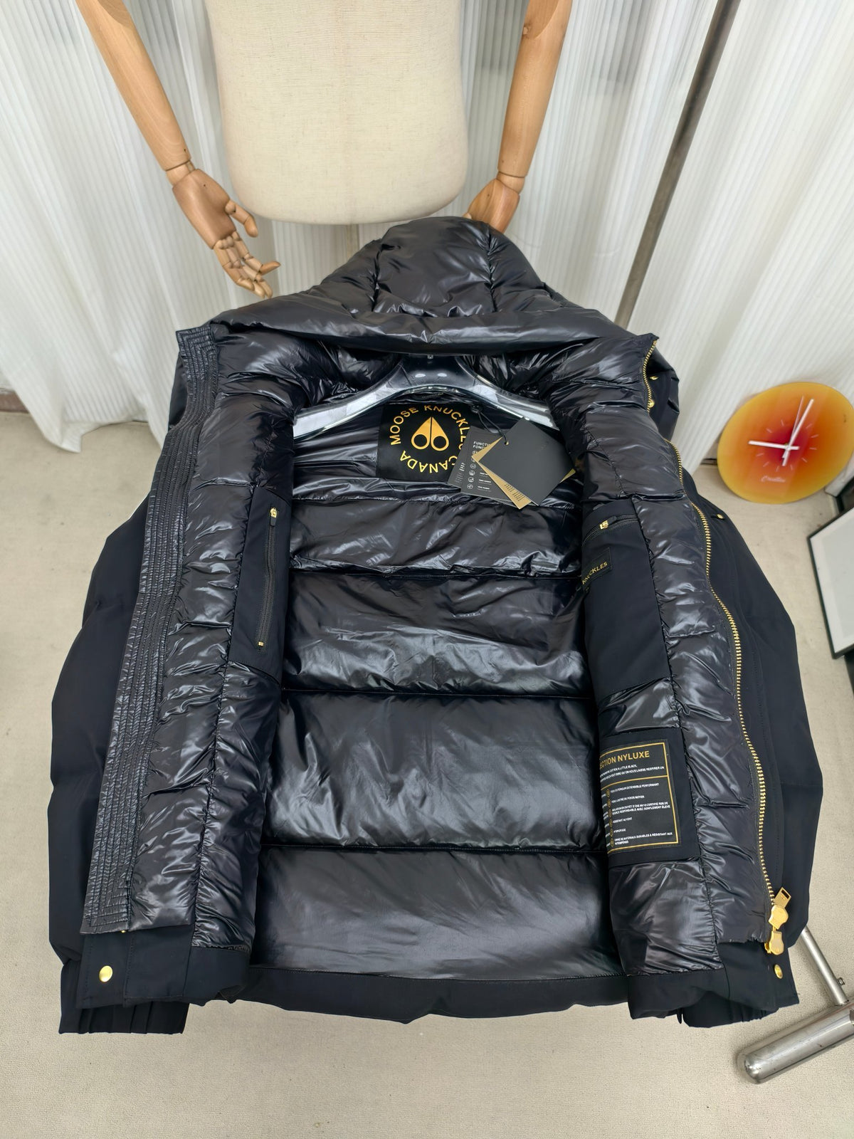 Moose Knuckles Black Hooded Puffer Jacket with Gold-Tone Details