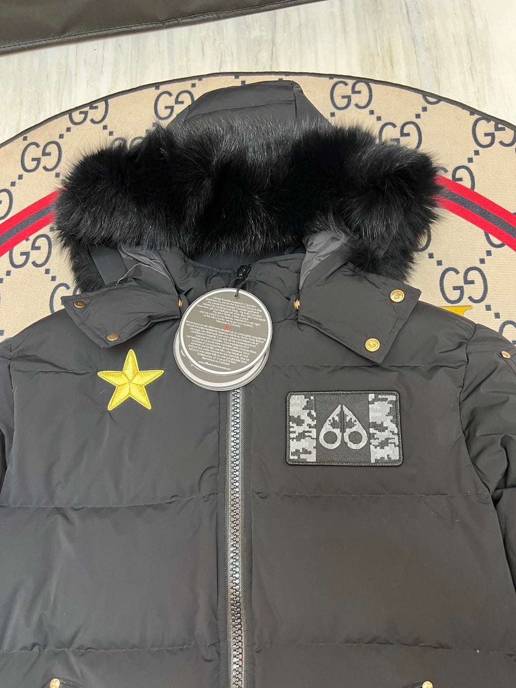 Moose Knuckles Unisex Black Hooded Bomber Jacket with Graphic Patches
